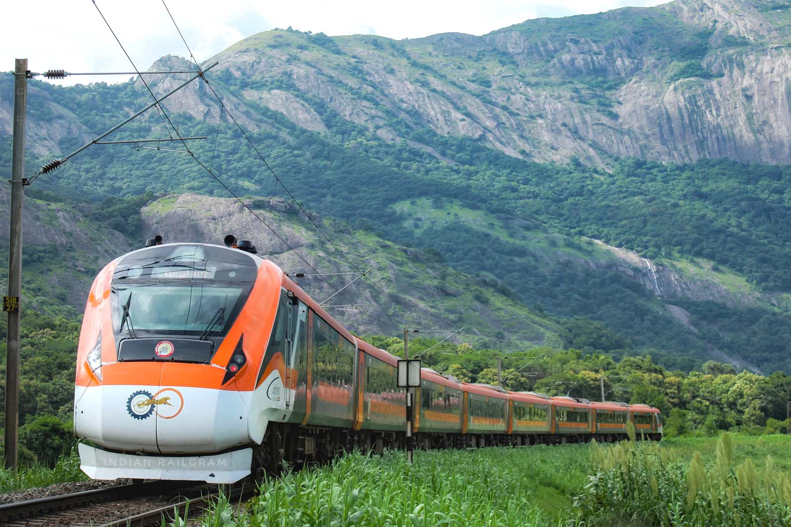 Vande Bharat Express through green paddy fields near Walayar, Palakkad